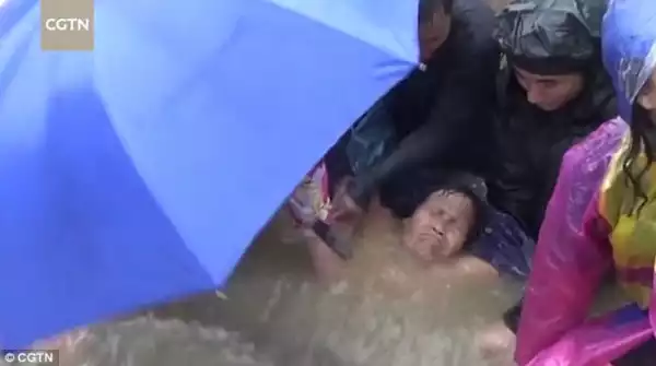 Elderly Woman Rescued By Villagers After Being Trapped In A Gutter See Photos